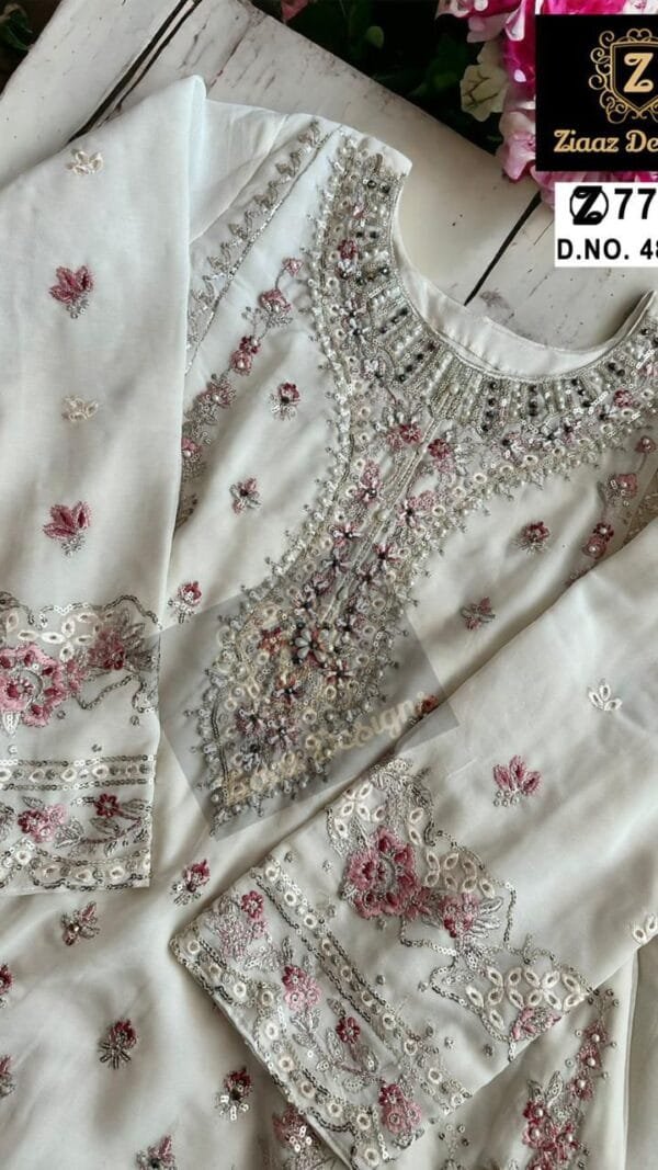 White Colour Georgette shaded very heavy embroidered Suits