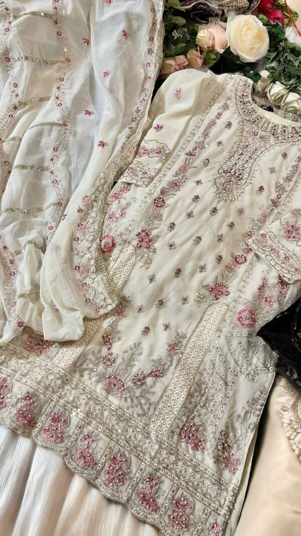 White Colour Georgette shaded very heavy embroidered Suits