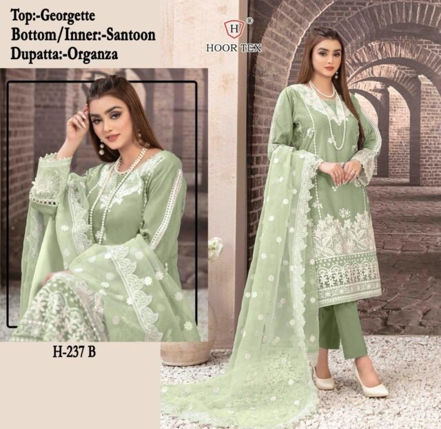 Green Colour FOX GEORGETTE Suits