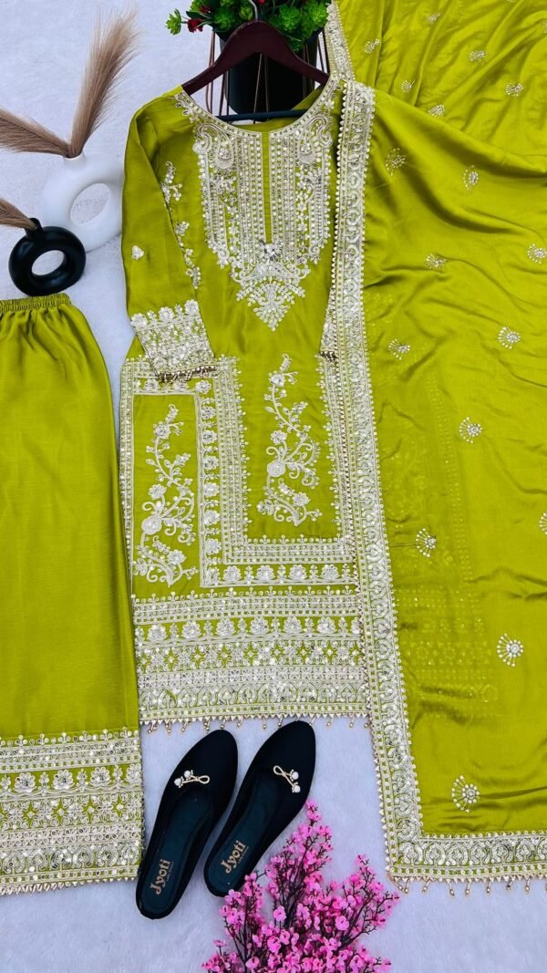 Green Colour Pure Chinnon Silk With Heavy Embroidery Suit