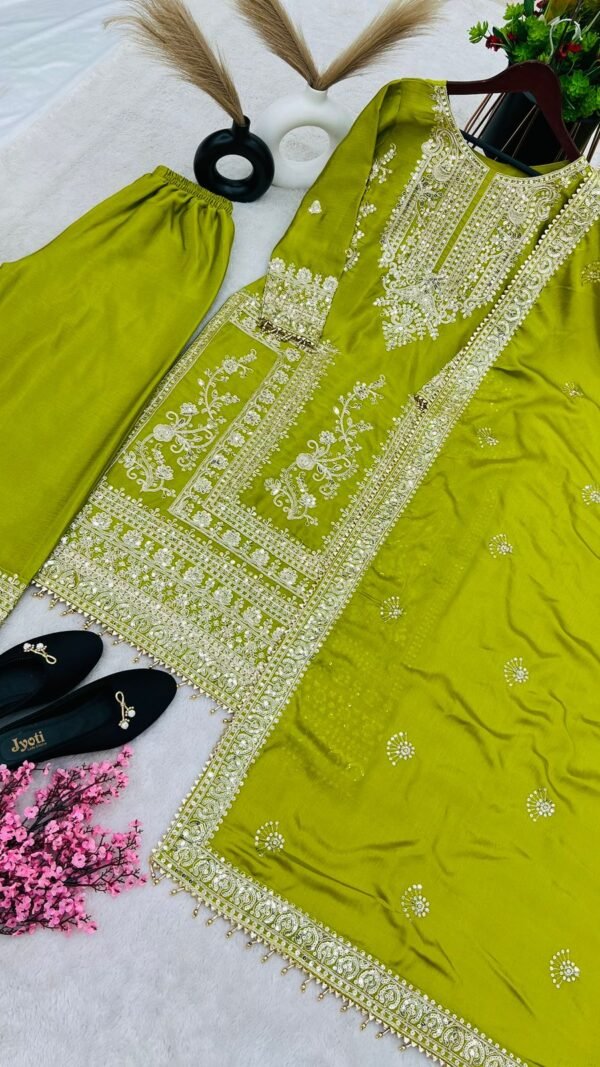 Green Colour Pure Chinnon Silk With Heavy Embroidery Suit