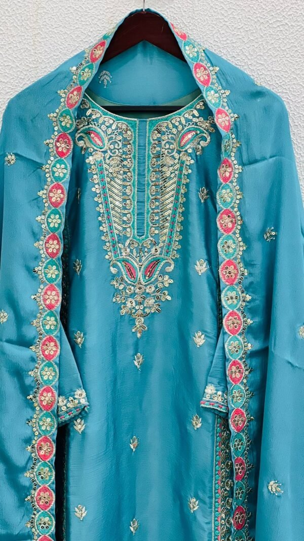Sky Blue Colour Pure Chinnon Silk With Heavy Embroidery Suit
