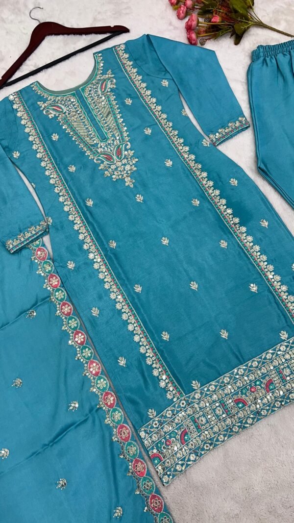 Sky Blue Colour Pure Chinnon Silk With Heavy Embroidery Suit