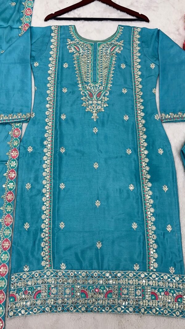 Sky Blue Colour Pure Chinnon Silk With Heavy Embroidery Suit