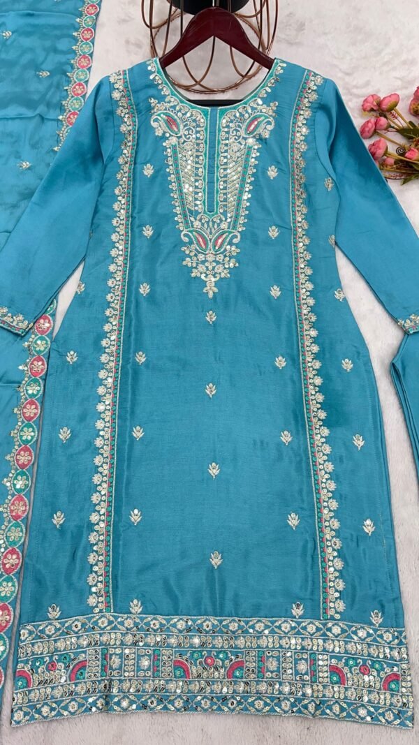 Sky Blue Colour Pure Chinnon Silk With Heavy Embroidery Suit
