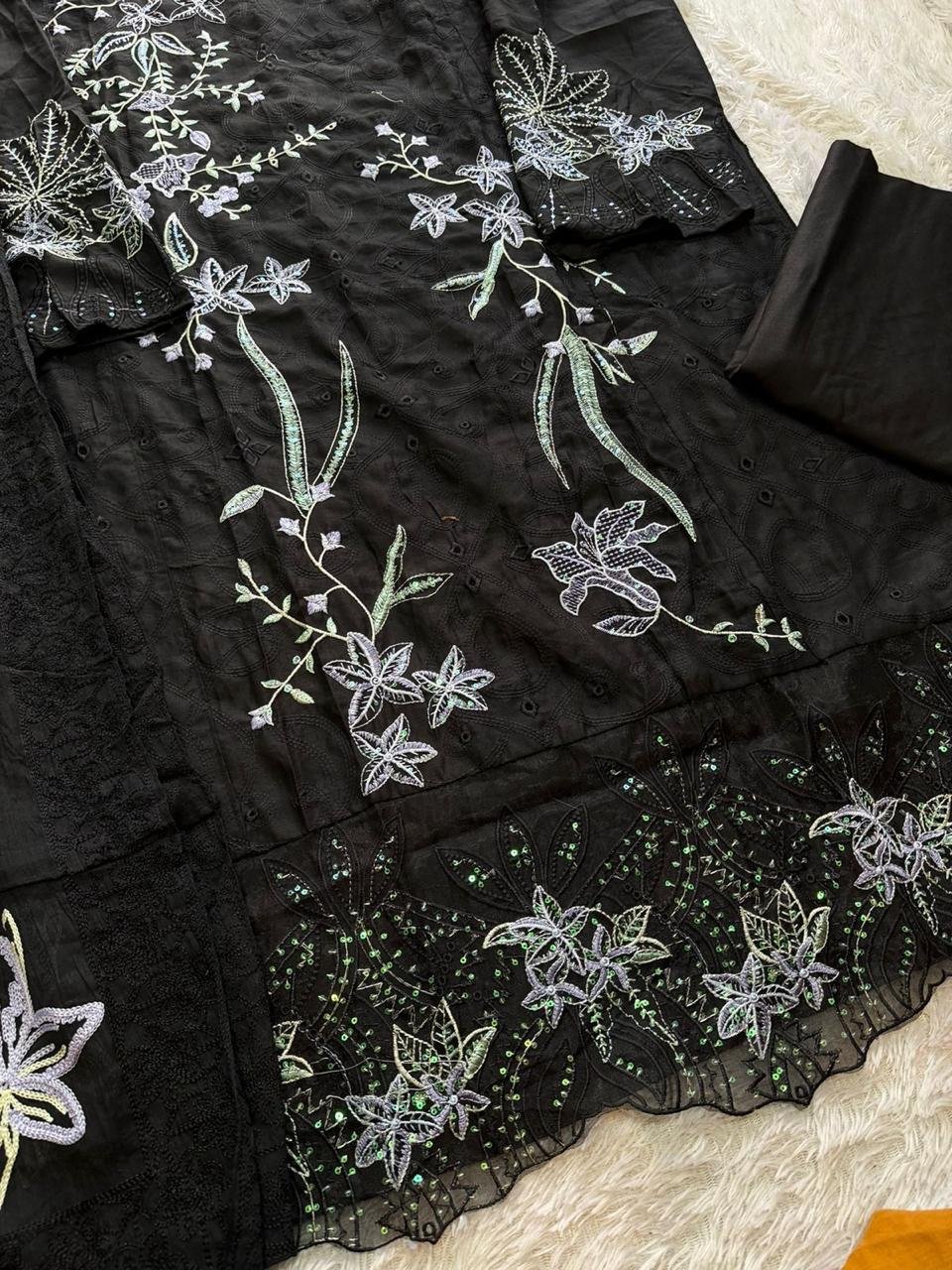 Black Pakistani suit under ₹1500 with pure cambric cotton heavy self embroidery and cotton mal embroidered dupatta